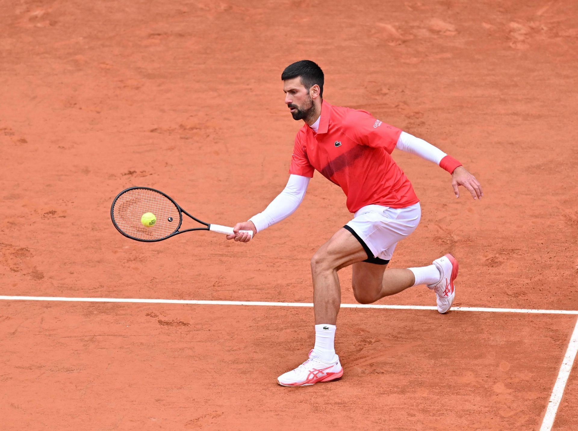 The Serb in action during his first-round match against Mackenzie McDonald at the 2025 French Open (Source: Getty)